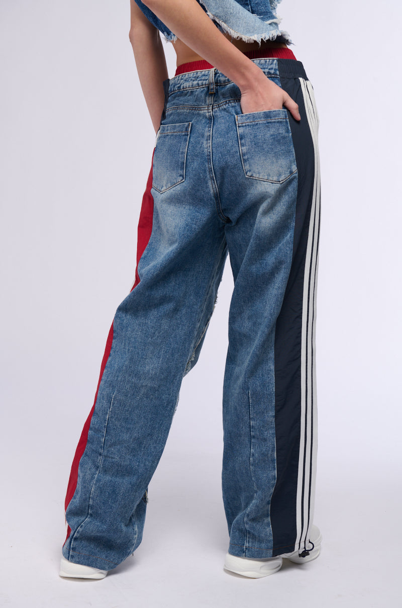 ALL AROUND THE WORLD PATCHWORK DENIM JOGGER PANT IN RED MULTI