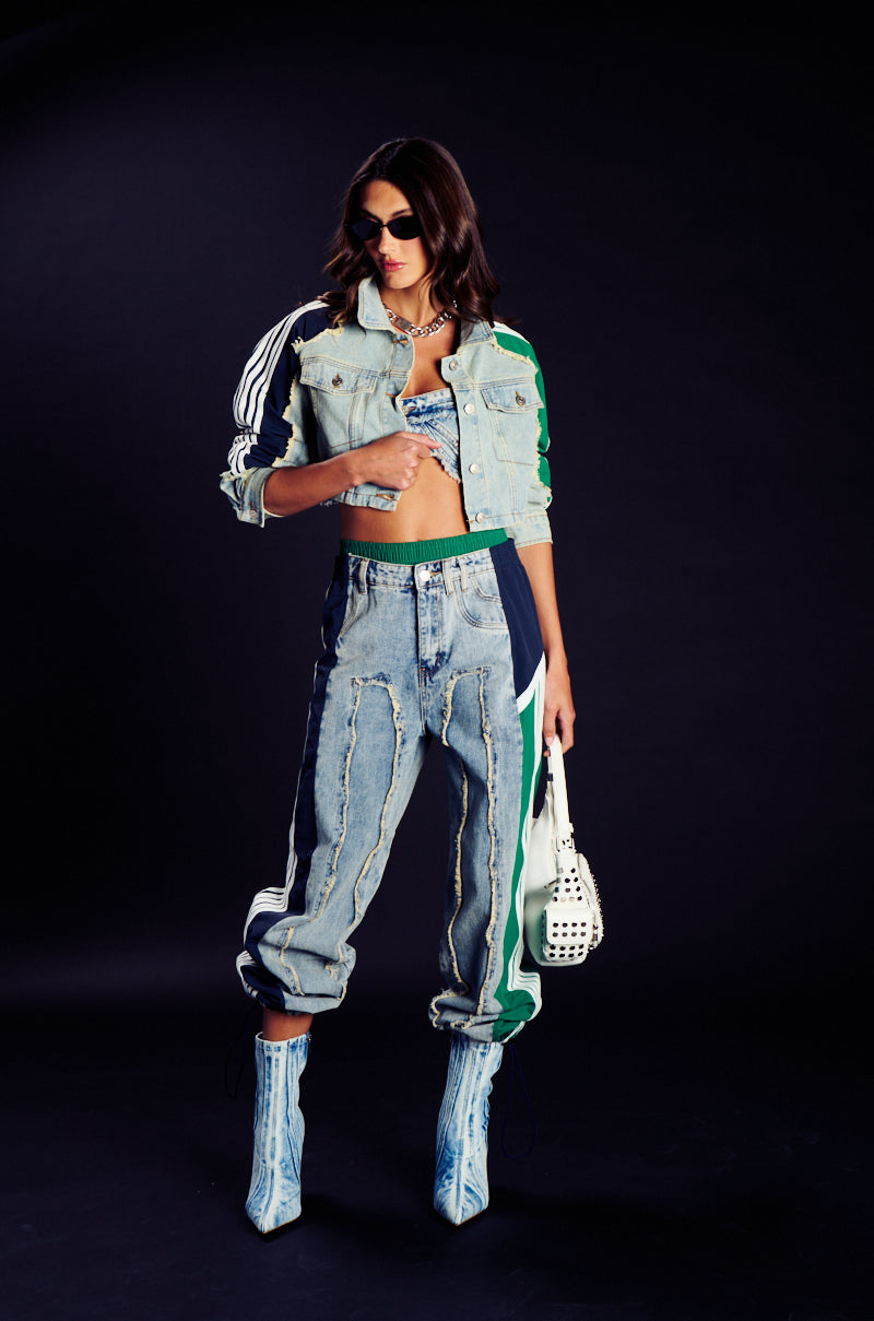 ALL AROUND THE WORLD PATCHWORK DENIM JOGGER PANT IN GREEN MULTI