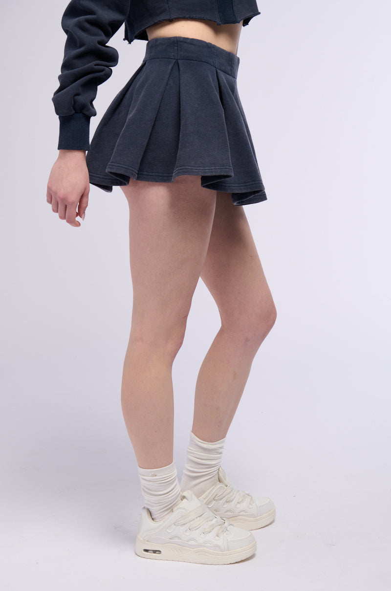 THINKING OF A PLACE PLEATED KNIT MINI SKIRT