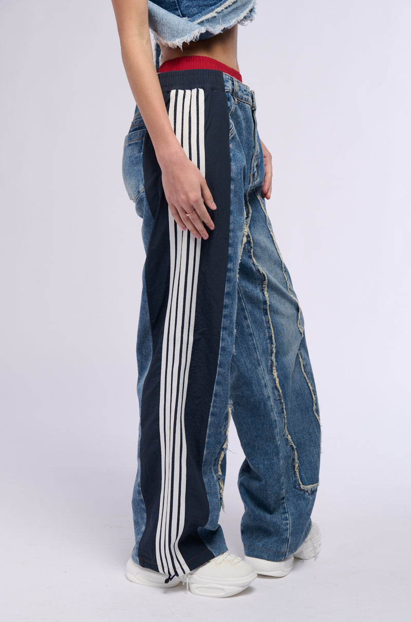 ALL AROUND THE WORLD PATCHWORK DENIM JOGGER PANT IN RED MULTI