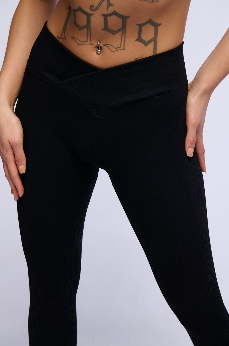 PAXTON RIBBED CROSS FRONT FLARED LEGGING IN BLACK