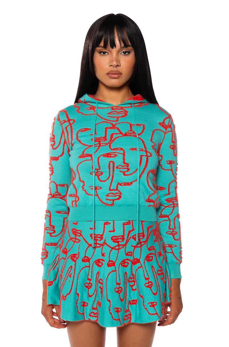 FACES AND PLACES REVERSIBLE KNIT HOODIE