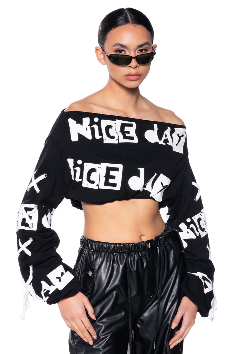 WRITTEN ON THE WALL OFF THE SHOULDER SWEATSHIRT