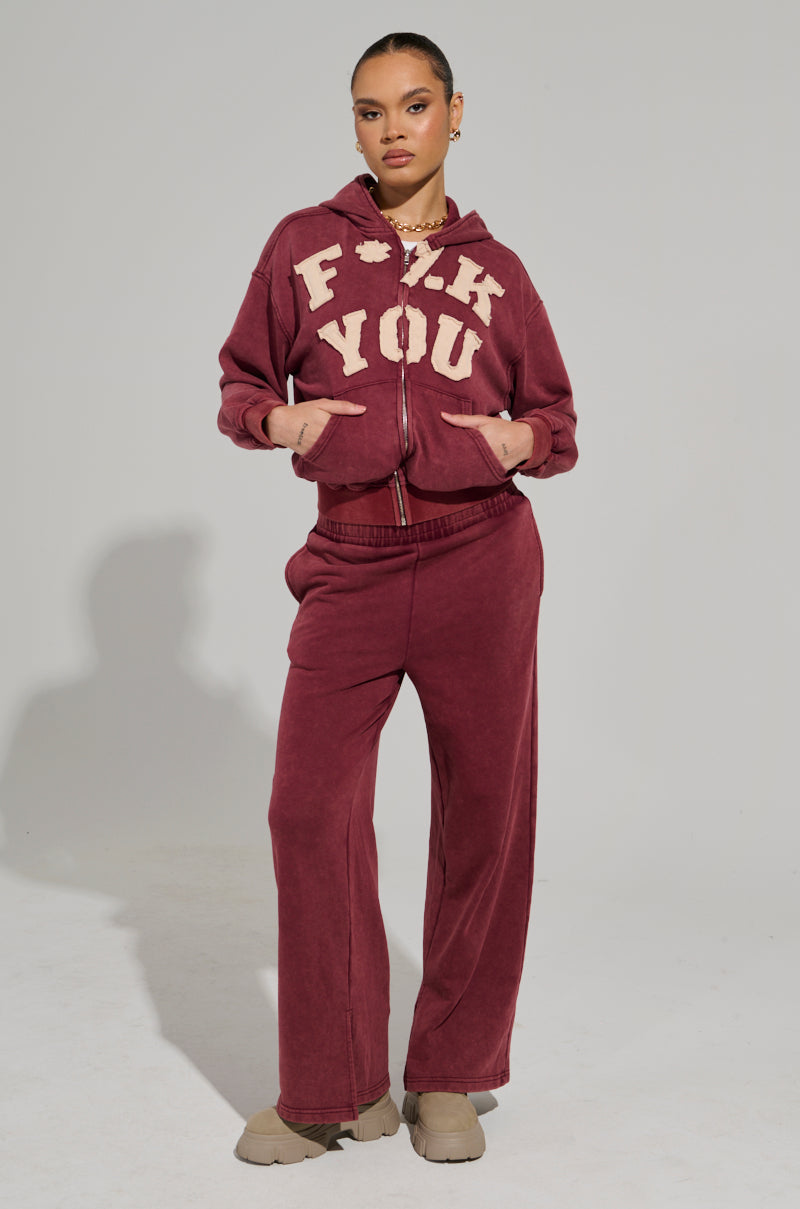 GRAPHIC LANGUAGE MINERAL WASH SWEAT PANT IN BURGUNDY