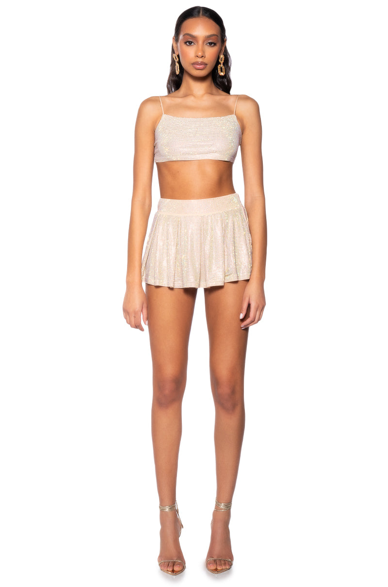 DIAMONDS DANCING PLEATED MINI SKIRT IN BEIGE