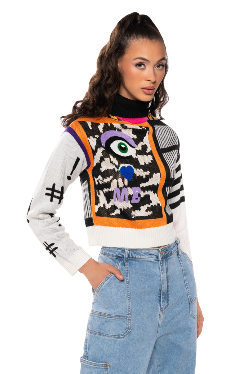 EYES ON ME GRAPHIC TURTLENECK SWEATER