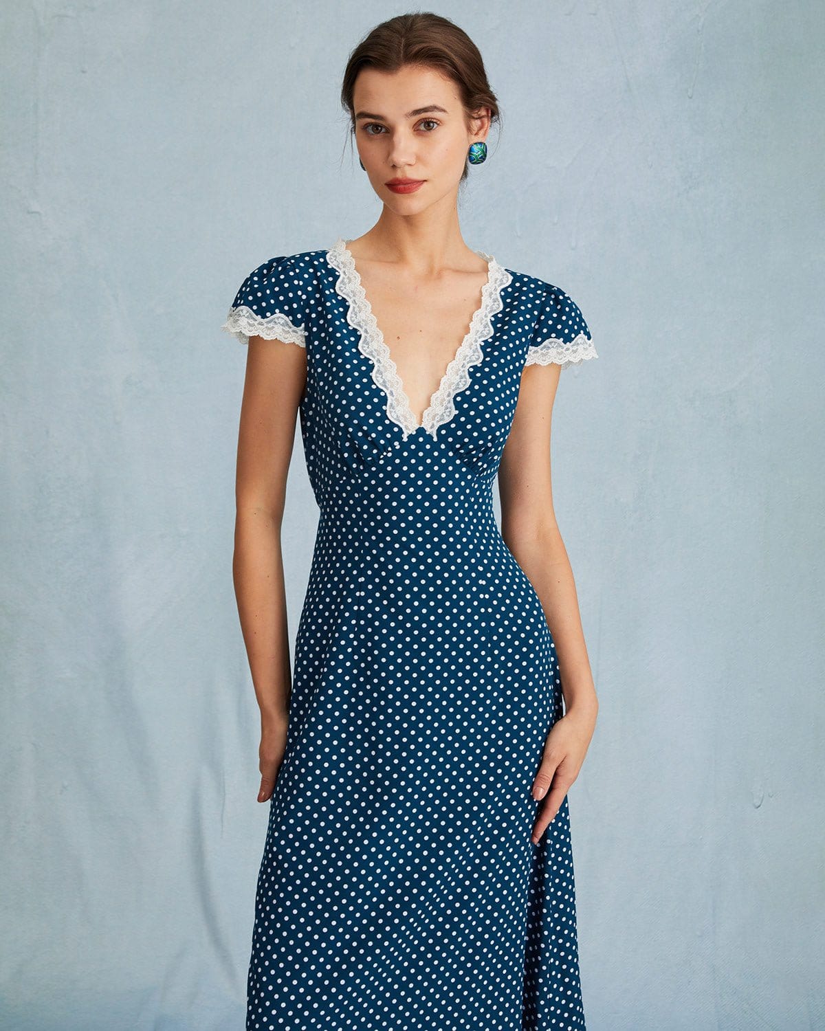 The Navy V Neck Polka Dot Lace Ruched Maxi Dress