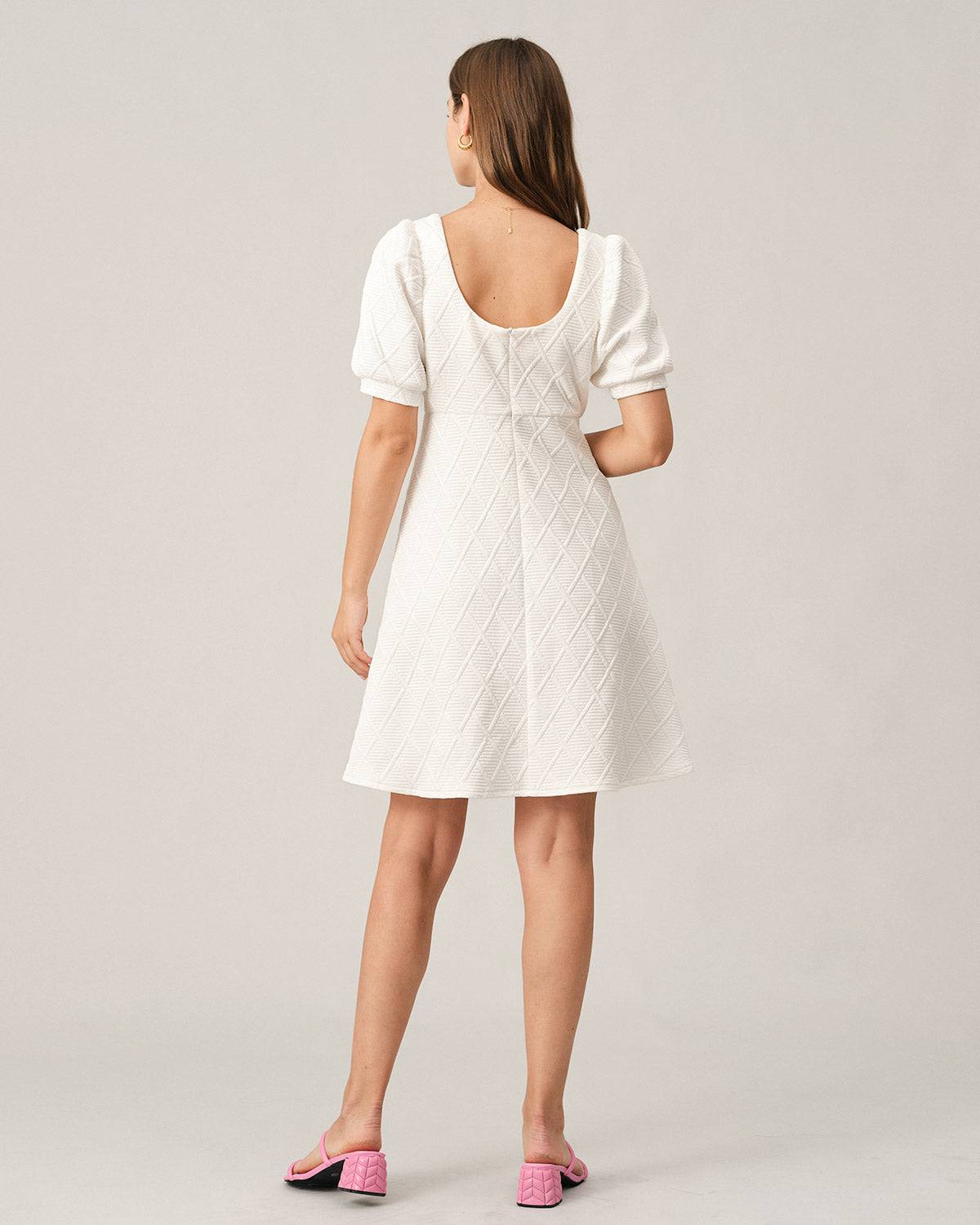 The Solid Textured Puff Sleeve Mini Dress